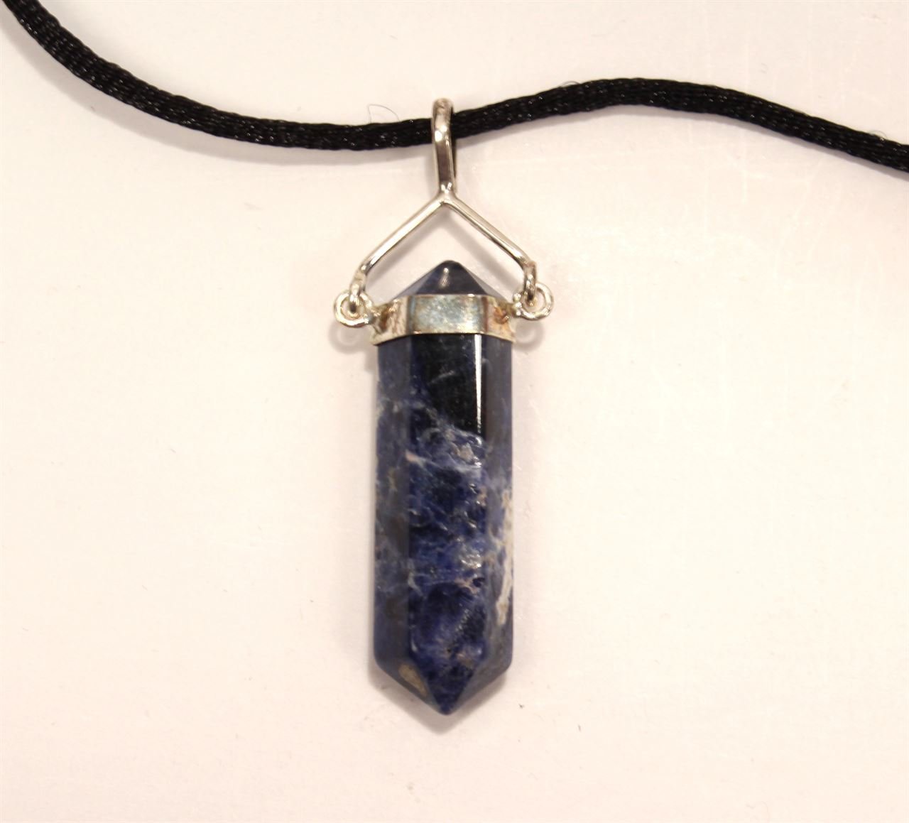 Sterling Silver-Sodalite Success in Court Crystal Point Necklace - Image 1